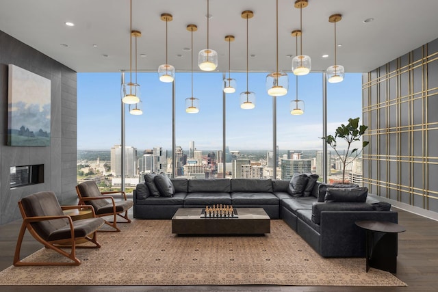 1616 W End Ave Unit 2609, Nashville, TN 37203 - living area with wood finished floors, a city view, wallpapered walls, and expansive windows