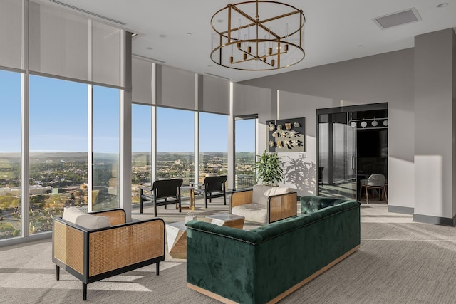 1616 W End Ave Unit 2609, Nashville, TN 37203 - living room with light carpet, healthy amount of natural light, expansive windows, a chandelier, and a towering ceiling