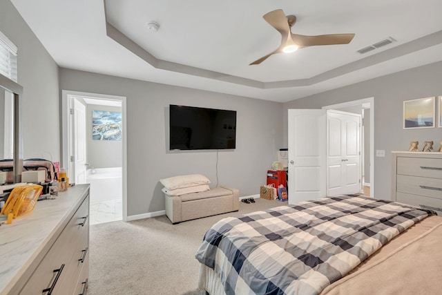 4418 Prometheus Way, Murfreesboro, TN 37128 - bedroom featuring light colored carpet, ensuite bath, ceiling fan, and a tray ceiling