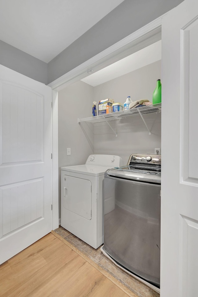 4418 Prometheus Way, Murfreesboro, TN 37128 - laundry room featuring washing machine and dryer and light wood-style floors