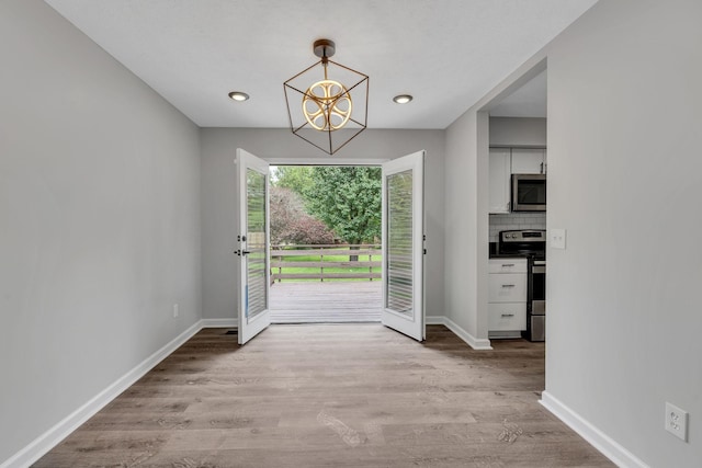 545 Old Lebanon Dirt Rd, Hermitage, TN 37076 - entryway with a chandelier, light wood-type flooring, and recessed lighting