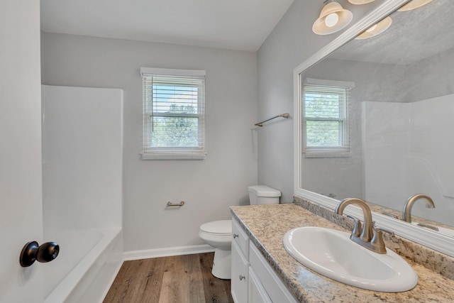 545 Old Lebanon Dirt Rd, Hermitage, TN 37076 - full bath featuring vanity, wood finished floors, and washtub / shower combination