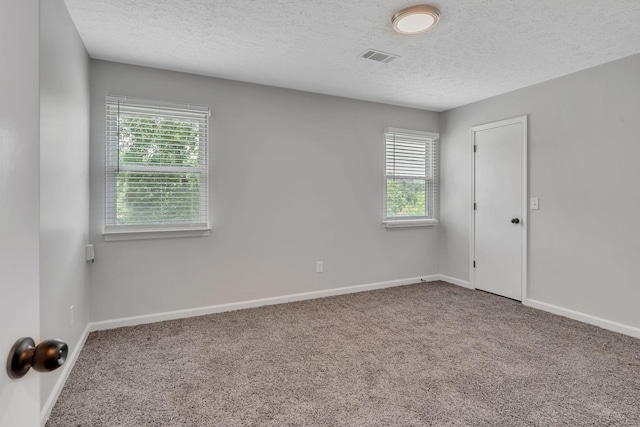 545 Old Lebanon Dirt Rd, Hermitage, TN 37076 - carpeted spare room featuring a textured ceiling and baseboards