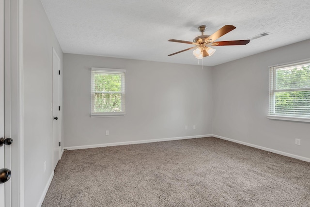 545 Old Lebanon Dirt Rd, Hermitage, TN 37076 - empty room featuring carpet flooring, a textured ceiling, and a ceiling fan