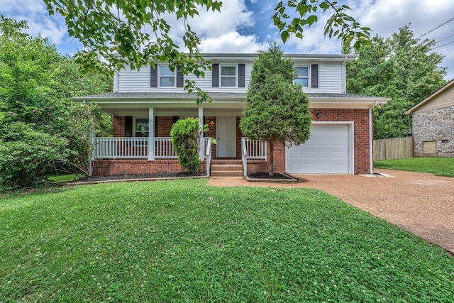 545 Old Lebanon Dirt Rd, Hermitage, TN 37076 - view of front of home featuring an attached garage, driveway, brick siding, and a porch