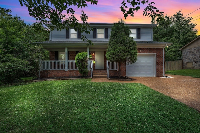 545 Old Lebanon Dirt Rd, Hermitage, TN 37076 - traditional-style house with a garage, concrete driveway, brick siding, and a porch