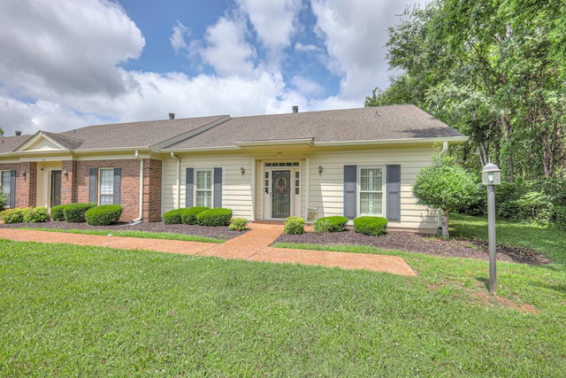 943 E Northfield Blvd, Murfreesboro, TN 37130 - ranch-style home with a front lawn, brick siding, and roof with shingles