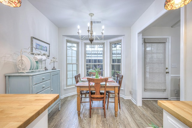 943 E Northfield Blvd, Murfreesboro, TN 37130 - dining room featuring a chandelier and wood finished floors