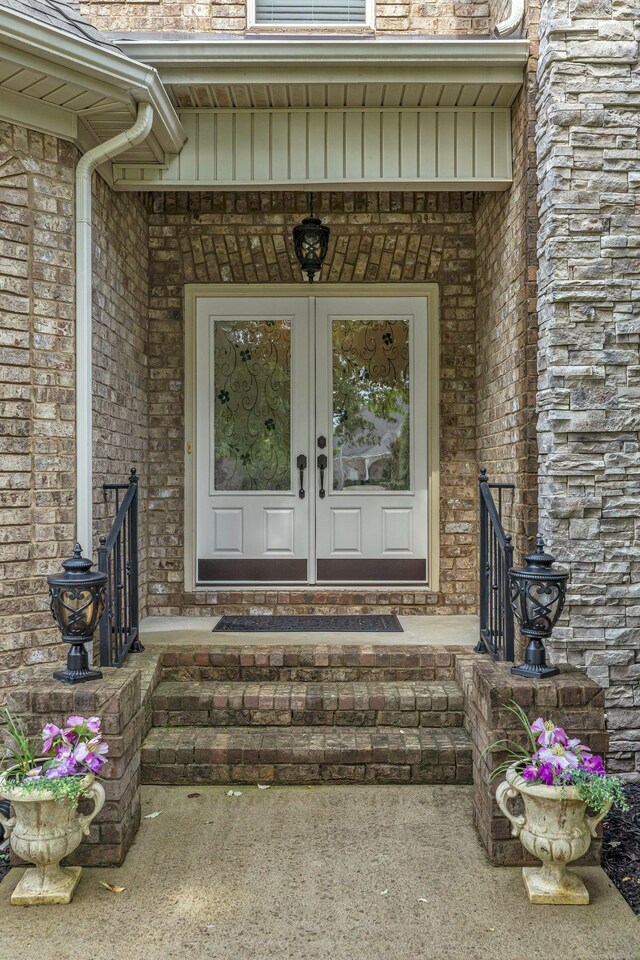 2711 Crowne Pointe Dr, Murfreesboro, TN 37130 - doorway to property featuring french doors, brick siding, and stone siding