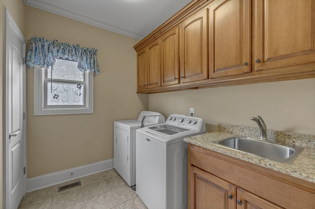 2711 Crowne Pointe Dr, Murfreesboro, TN 37130 - washroom featuring separate washer and dryer, cabinet space, ornamental molding, and light tile patterned floors