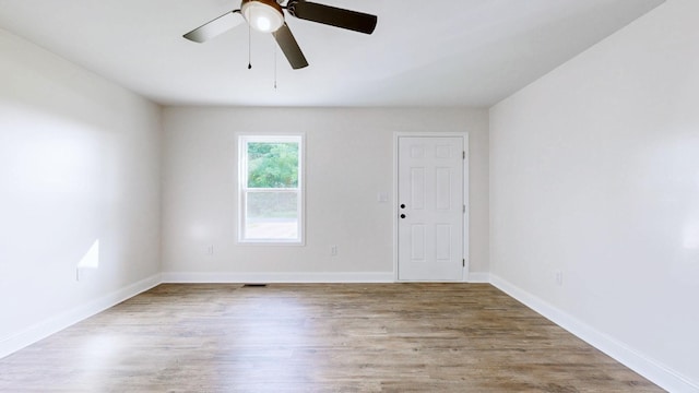 152 Mink Branch Rd E, Waynesboro, TN 38485 - empty room with ceiling fan and wood finished floors