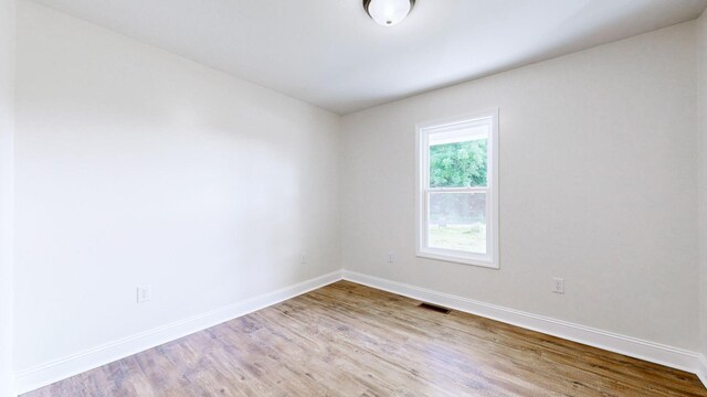 152 Mink Branch Rd E, Waynesboro, TN 38485 - empty room with wood finished floors