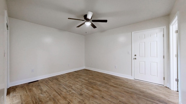 152 Mink Branch Rd E, Waynesboro, TN 38485 - empty room with ceiling fan and wood finished floors