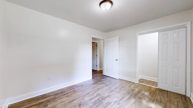 152 Mink Branch Rd E, Waynesboro, TN 38485 - unfurnished bedroom featuring wood finished floors