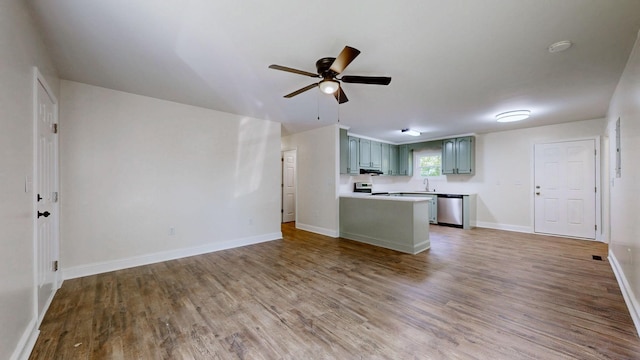152 Mink Branch Rd E, Waynesboro, TN 38485 - unfurnished living room featuring wood finished floors and a ceiling fan