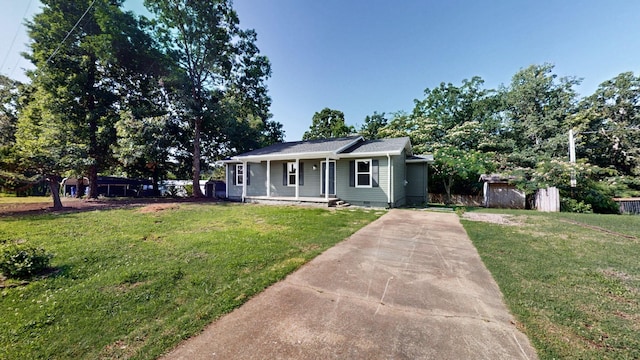 152 Mink Branch Rd E, Waynesboro, TN 38485 - view of front of house featuring covered porch, driveway, a front lawn, and crawl space