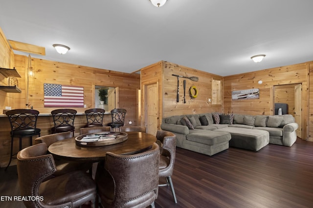 645 Bankston Ln, La Follette, TN 37766 - dining space with wooden walls and dark wood-style floors