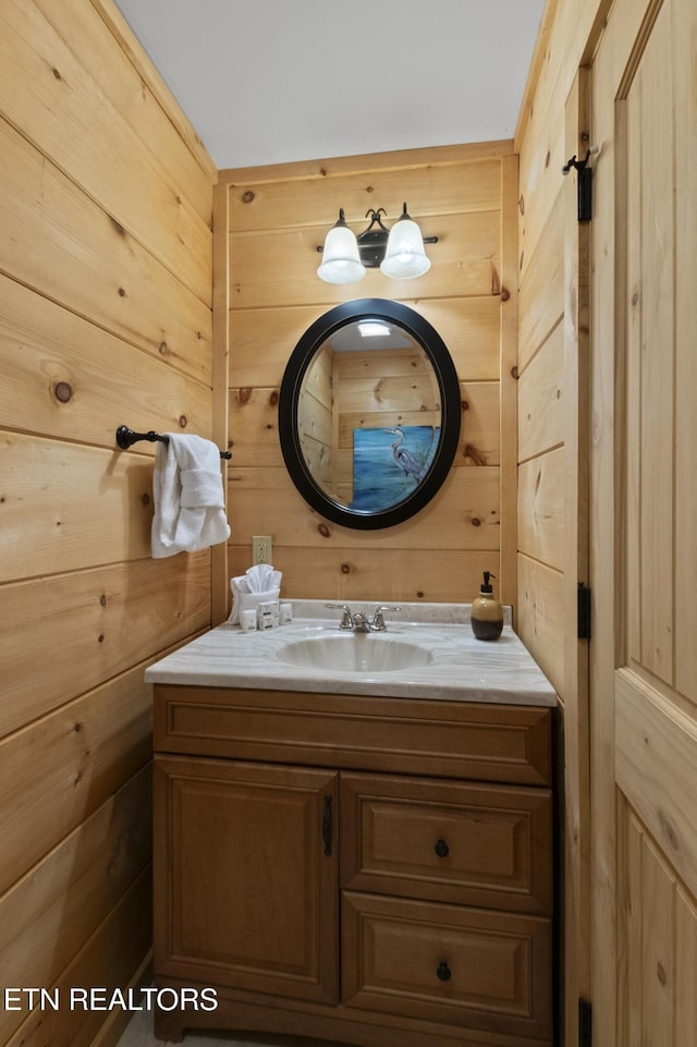 645 Bankston Ln, La Follette, TN 37766 - bathroom with wooden walls and vanity