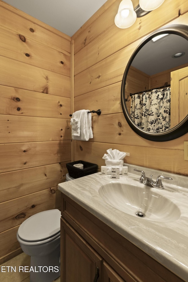 645 Bankston Ln, La Follette, TN 37766 - bathroom with vanity, wooden walls, and curtained shower