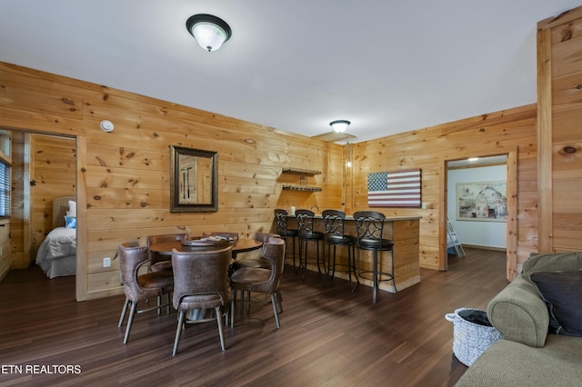 645 Bankston Ln, La Follette, TN 37766 - dining area featuring dark wood finished floors and wooden walls