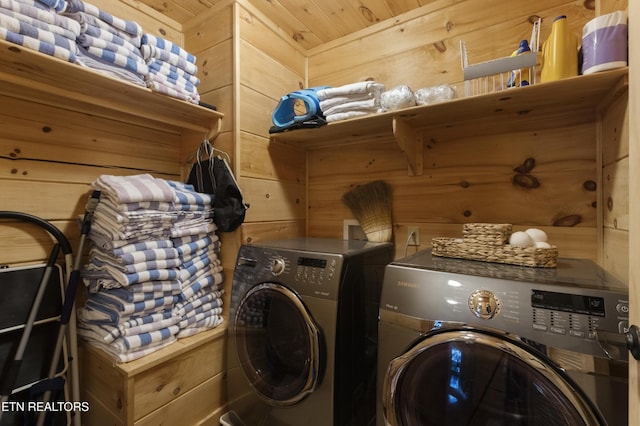 645 Bankston Ln, La Follette, TN 37766 - laundry room featuring washer and dryer and wooden walls