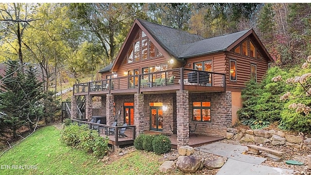 645 Bankston Ln, La Follette, TN 37766 - log cabin with stone siding, a deck, stairs, and a balcony