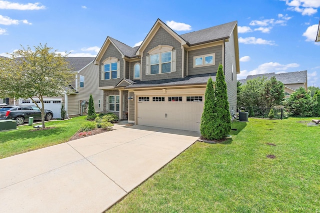 444 Heroit Dr, Spring Hill, TN 37174 - craftsman-style home with an attached garage, concrete driveway, and a front yard