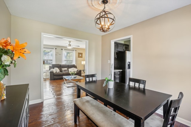 1287 Cheryl Ct, Clarksville, TN 37042 - dining area featuring a chandelier, dark wood-type flooring, and a ceiling fan
