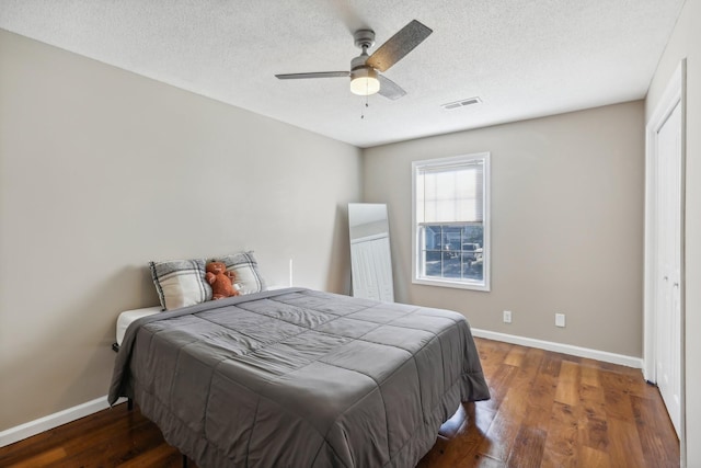 1287 Cheryl Ct, Clarksville, TN 37042 - bedroom with wood finished floors, a textured ceiling, a closet, and ceiling fan