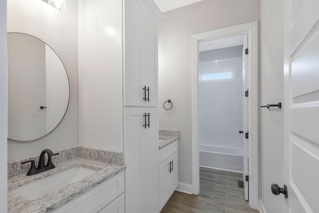 991 Scenic Dr, Pulaski, TN 38478 - bathroom featuring vanity, wood tiled floors, and bathtub / shower combination