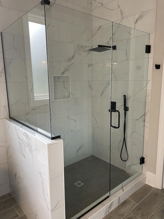 991 Scenic Dr, Pulaski, TN 38478 - bathroom with a stall shower and wood finish floors