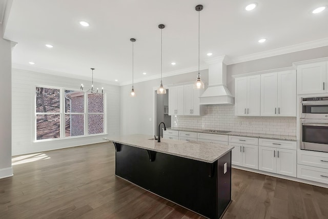 991 Scenic Dr, Pulaski, TN 38478 - kitchen featuring custom range hood, tasteful backsplash, a center island with sink, dark wood-style flooring, and white cabinetry
