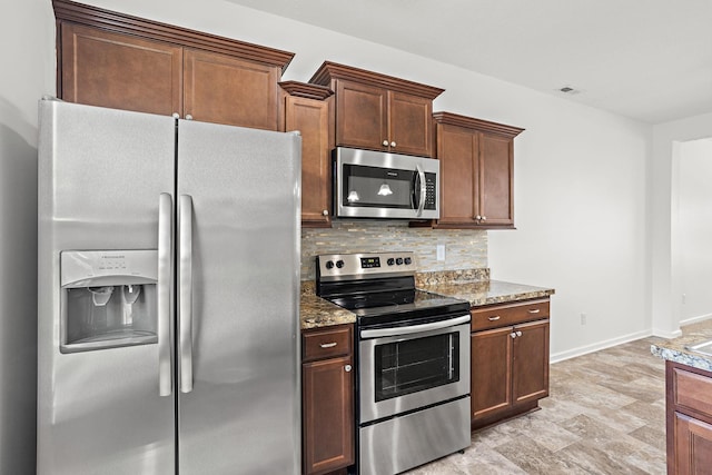 164 Ramsden Ave, La Vergne, TN 37086 - kitchen featuring stainless steel appliances, tasteful backsplash, and stone counters