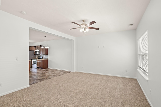 164 Ramsden Ave, La Vergne, TN 37086 - empty room featuring carpet flooring, a smoke detector, ceiling fan, and a chandelier