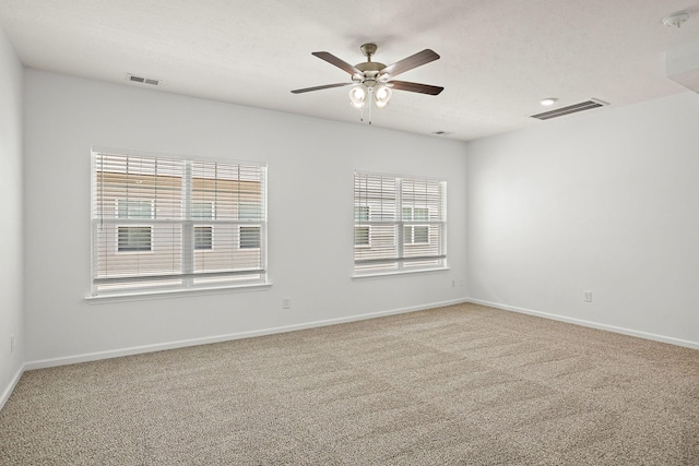164 Ramsden Ave, La Vergne, TN 37086 - spare room featuring a ceiling fan, carpet floors, and a smoke detector