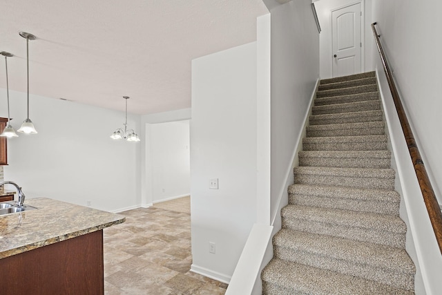 164 Ramsden Ave, La Vergne, TN 37086 - stairs with baseboards and a chandelier