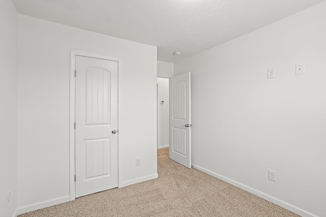 164 Ramsden Ave, La Vergne, TN 37086 - unfurnished bedroom with light carpet and a textured ceiling