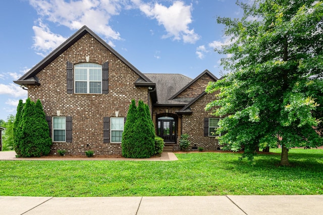212 Hickory Pointe Dr, Lebanon, TN 37087 - view of front of house with a front yard and brick siding