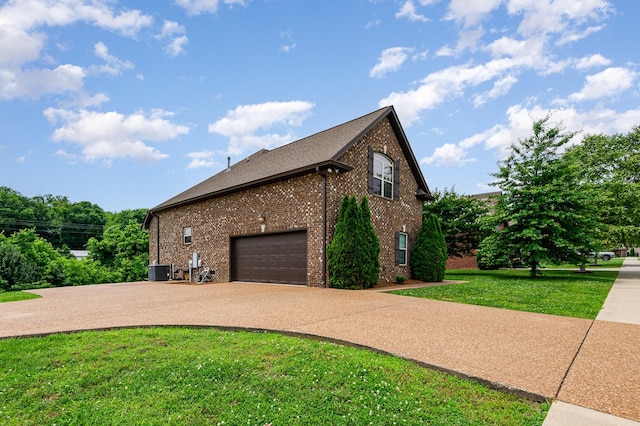 212 Hickory Pointe Dr, Lebanon, TN 37087 - view of side of property featuring brick siding, driveway, a lawn, and a garage