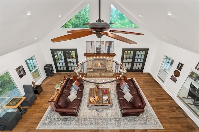 7871 Oscar Green Rd, Primm Springs, TN 38476 - living room with high vaulted ceiling, a ceiling fan, wood finished floors, french doors, and plenty of natural light