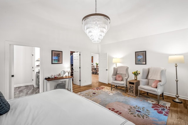 7871 Oscar Green Rd, Primm Springs, TN 38476 - bedroom featuring a chandelier and wood finished floors