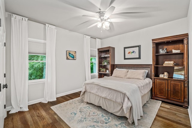 7871 Oscar Green Rd, Primm Springs, TN 38476 - bedroom with dark wood-style floors and ceiling fan