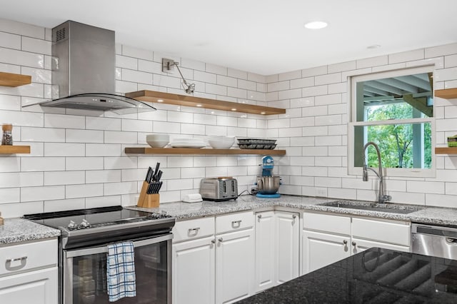 7871 Oscar Green Rd, Primm Springs, TN 38476 - kitchen with open shelves, stainless steel appliances, island exhaust hood, and tasteful backsplash