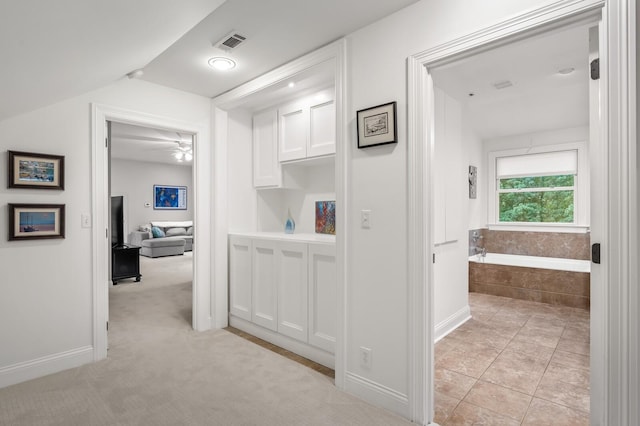 7871 Oscar Green Rd, Primm Springs, TN 38476 - corridor with light tile patterned floors and baseboards