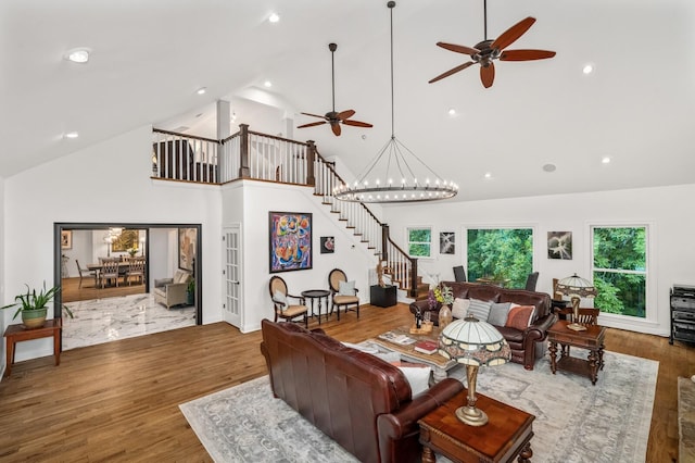 7871 Oscar Green Rd, Primm Springs, TN 38476 - living room with stairs, high vaulted ceiling, ceiling fan, wood finished floors, and recessed lighting