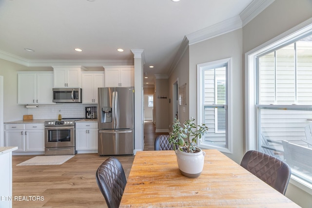 102 Chaseberry Rd, Oak Ridge, TN 37830 - dining area featuring ornamental molding, light wood-style flooring, and recessed lighting