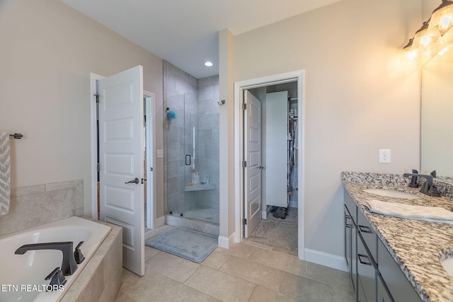 102 Chaseberry Rd, Oak Ridge, TN 37830 - bathroom featuring vanity, a stall shower, a garden tub, and tile patterned flooring