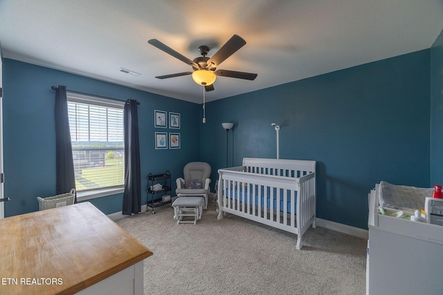 102 Chaseberry Rd, Oak Ridge, TN 37830 - carpeted bedroom featuring ceiling fan and a nursery area