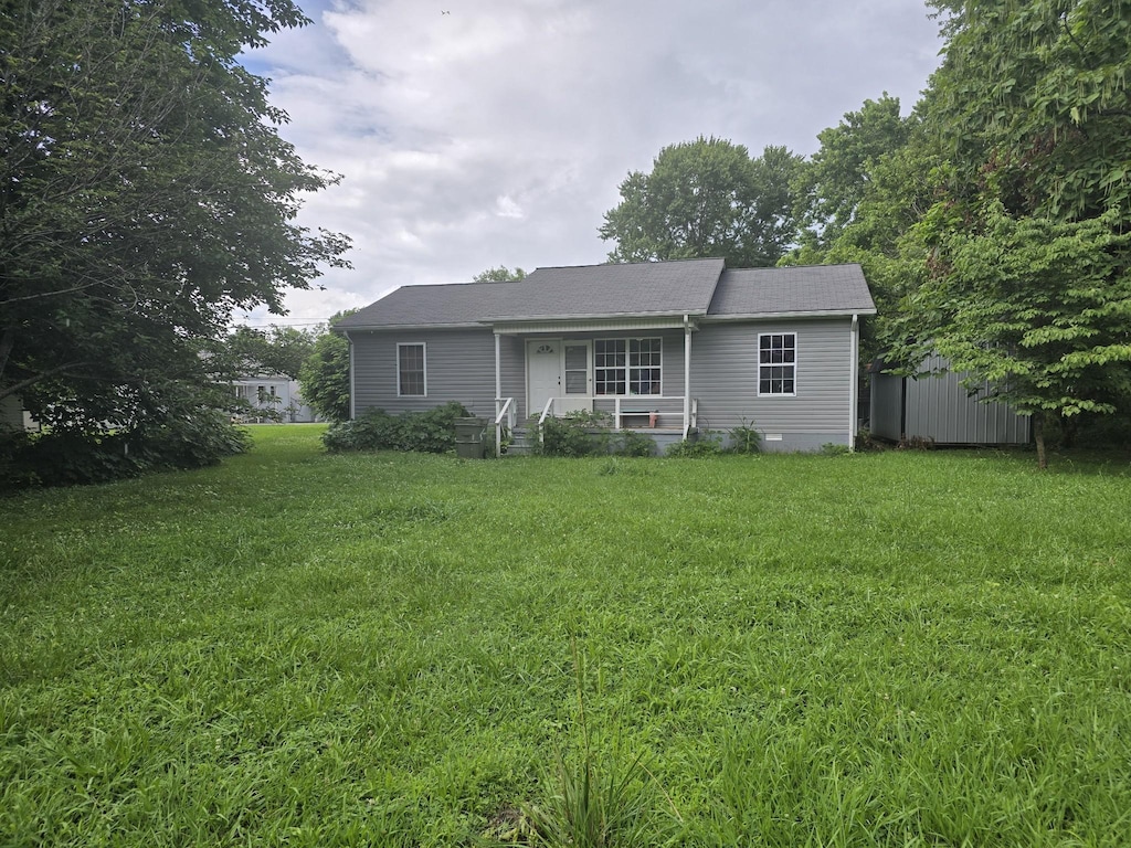 506 3rd St, Lawrenceburg, TN 38464 - rear view of property featuring a yard and a porch