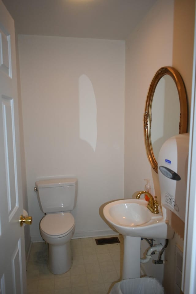 742 Lancaster Hwy, Lancaster, TN 38569 - bathroom featuring toilet and tile patterned floors